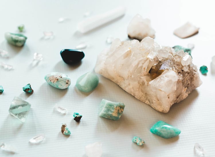 colorful crystals on a white background including turquoise.