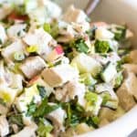 white bowl of whole30 Chicken Salad on a gray background