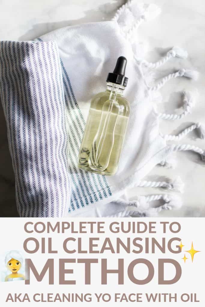 Light gray table with a bottle of face oil for the oil cleansing method along with a turkish towel. Text beneath reads: Complete Guide to Oil Cleansing Method AKA Cleaning Yo Face With Oil.